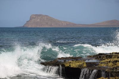 Scenic view of sea against clear sky