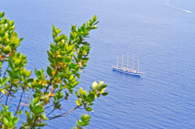 High angle view of boat sailing in sea