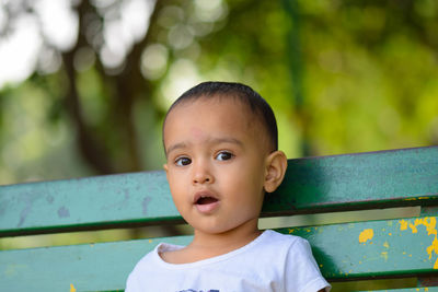Portrait of cute boy looking away