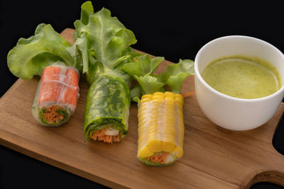 High angle view of food on table against black background