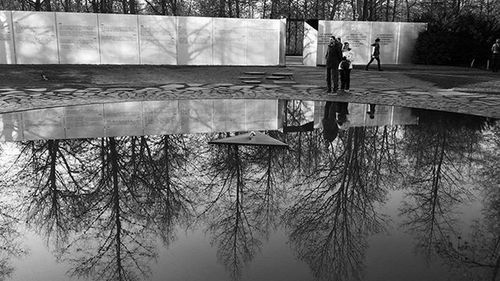 Reflection of woman in water