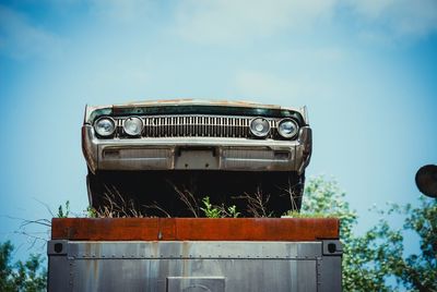 Low angle view of car against sky