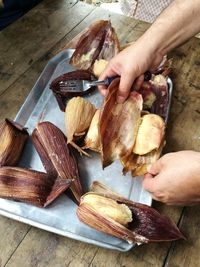 Close-up of hands holding food