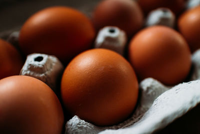 Close up photo of carton of eggs.