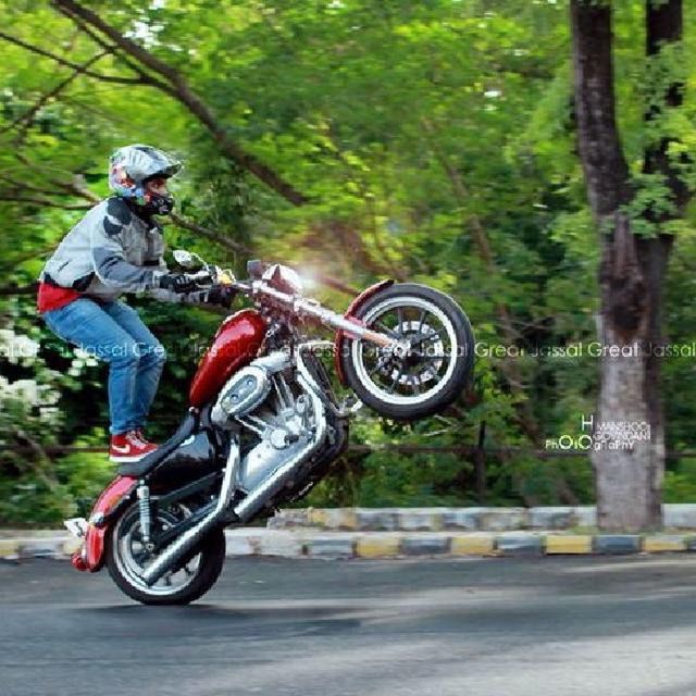 bicycle, transportation, land vehicle, tree, mode of transport, riding, lifestyles, leisure activity, cycling, full length, helmet, street, men, travel, motorcycle, road, day, motion