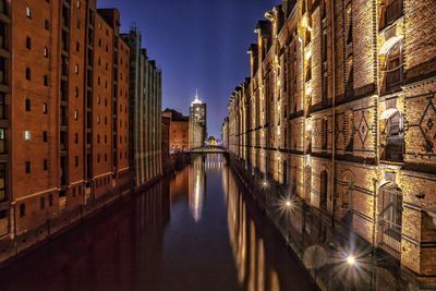 Panoramic view of illuminated city at night