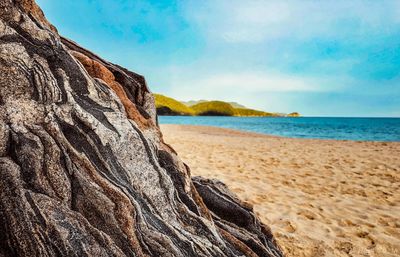 Scenic view of beach against sky