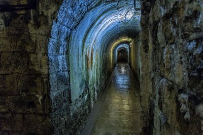 Empty illuminated tunnel in fortress