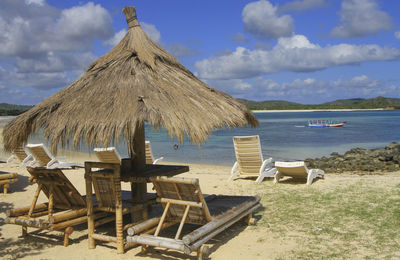 Deck chairs overlooking calm blue sea