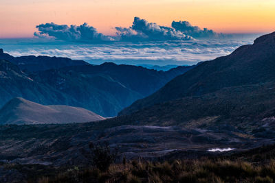 Scenic view of mountains against sky during sunset