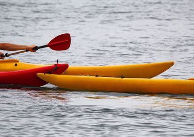 Person paragliding in river