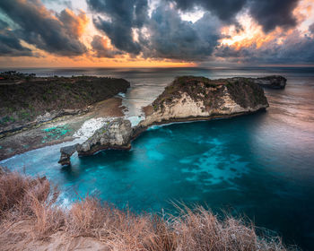 Scenic view of sea against sky during sunset