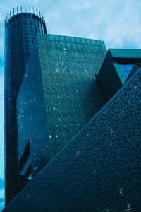 Low angle view of modern building against sky