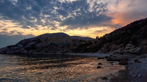 Scenic view of mountains against sky during sunset