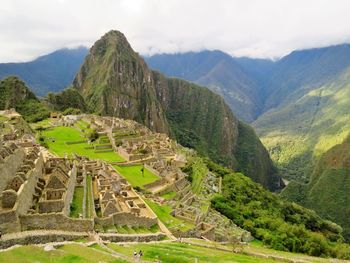 High angle view of machu picchu against cloudy sky