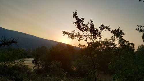 Scenic view of mountains against sky during sunset