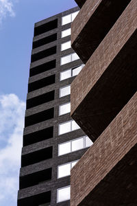 Low angle view of modern building against sky