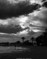 Scenic view of landscape against cloudy sky