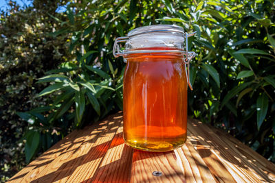 Close-up of drink in glass jar on table