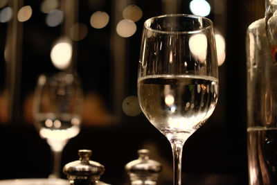 Close-up of wine bottles on table