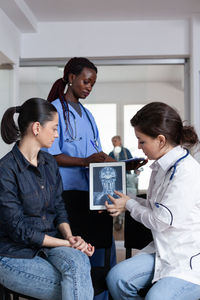 Side view of doctor working at clinic