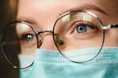 Close-up of woman wearing sunglasses