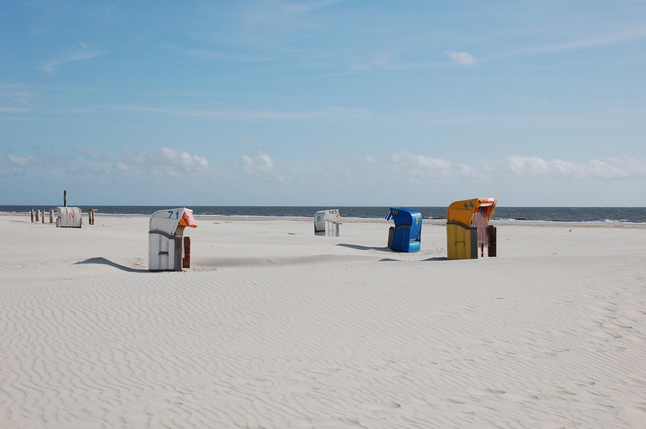 Beach baskets very lonely on the beach sunny day