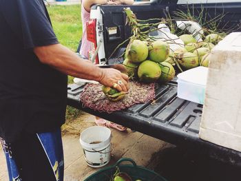 Man holding fruits