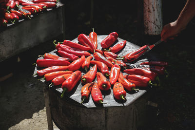 High angle view of red chili peppers for sale at market stall