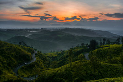 Scenic view of mountains against sky during sunset