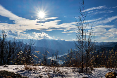 Scenic view of snowcapped mountains against sky