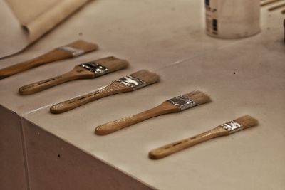 Close up of paintbrushes on table