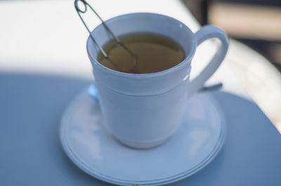 Close-up of tea cup on table