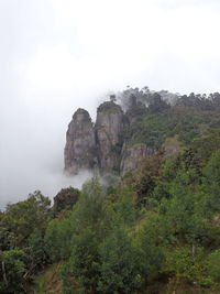 Scenic view of rocky mountains against sky