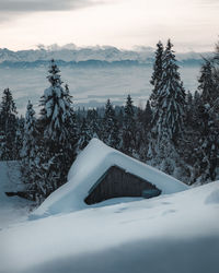 Scenic view of snow covered mountains against sky