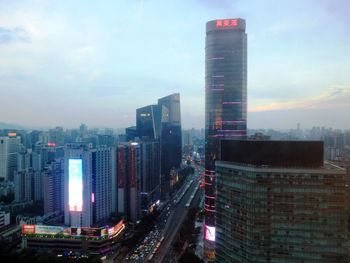 High angle view of illuminated cityscape against sky