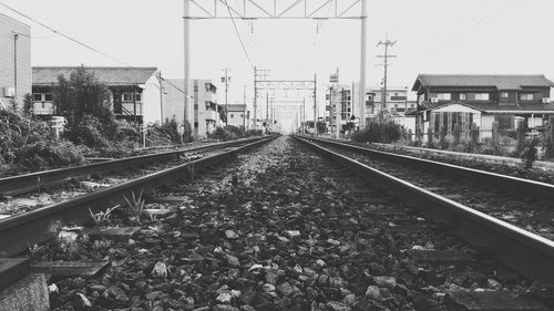 Railroad station against clear sky