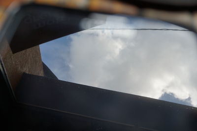 Low angle view of sky seen through window