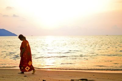 Scenic view of sea at sunset