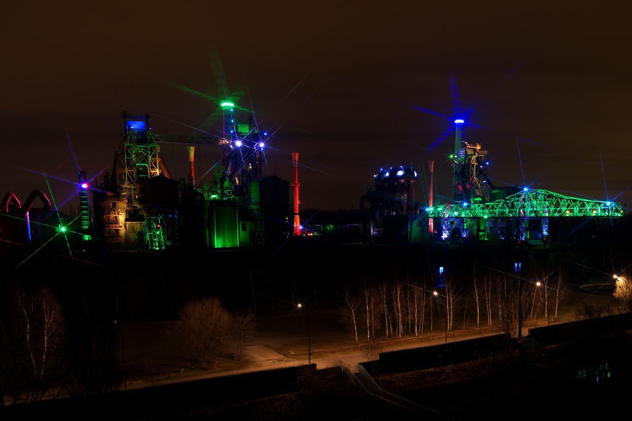 ILLUMINATED BUILDINGS AT NIGHT