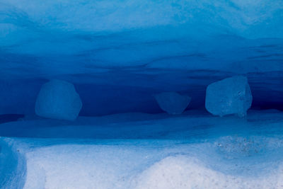 Close-up of ice floating on sea