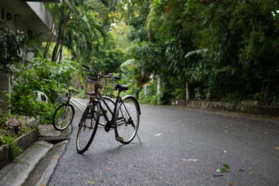 Bicycles parked on footpath in city