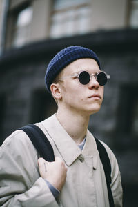 Man wearing sunglasses outdoors