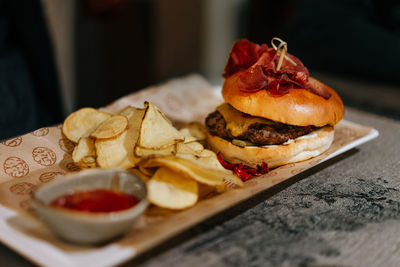 Close-up of burger in plate on table