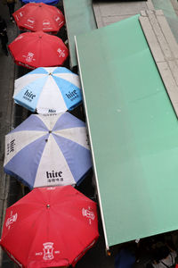 High angle view of multi colored umbrellas at market