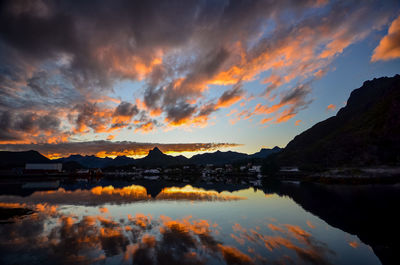 Scenic view of lake against sky during sunset