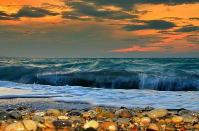 Scenic view of sea at sunset