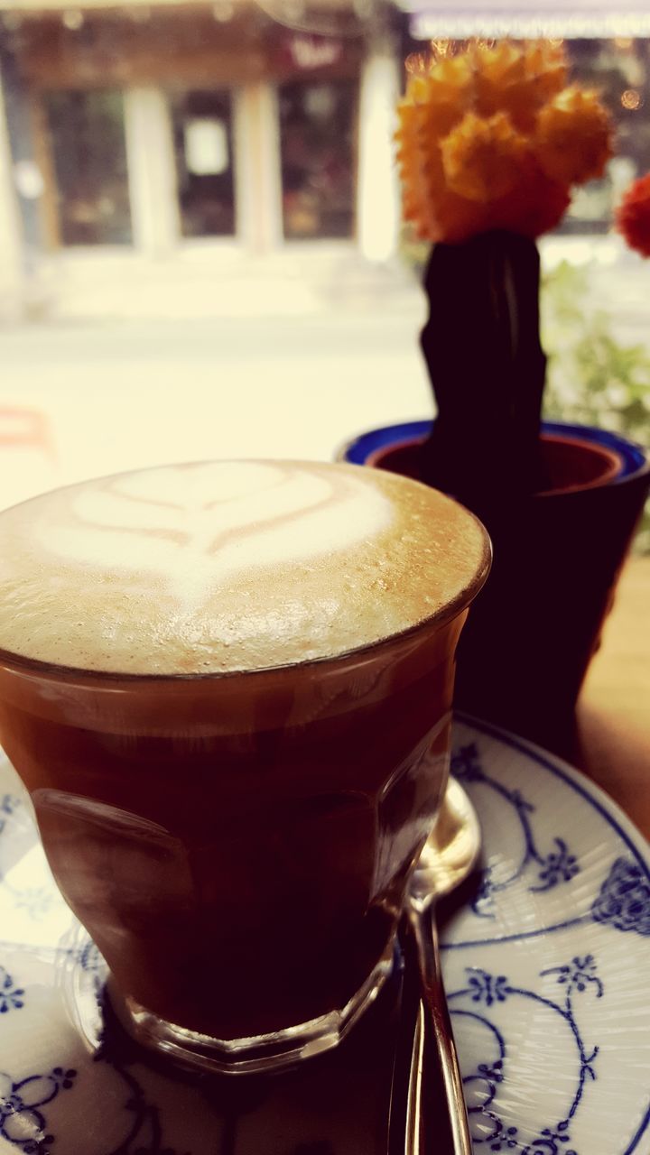 drink, food and drink, refreshment, coffee cup, coffee - drink, table, coffee, frothy drink, focus on foreground, close-up, freshness, indoors, saucer, cup, cafe, froth art, lifestyles, beverage