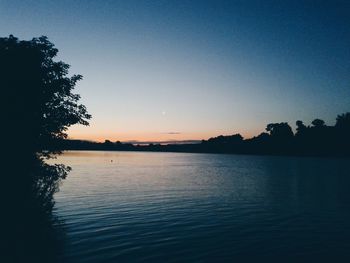 Scenic view of calm sea at sunset