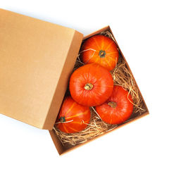 High angle view of orange fruits in box